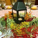 decoración centro de mesa vela y flores